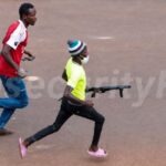 [VIDEO] Protester Runs Away With Grenade Launcher, Police Begin Manhunt